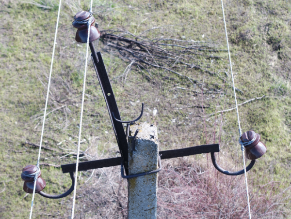 Example of acrooked cross-arm on a power line